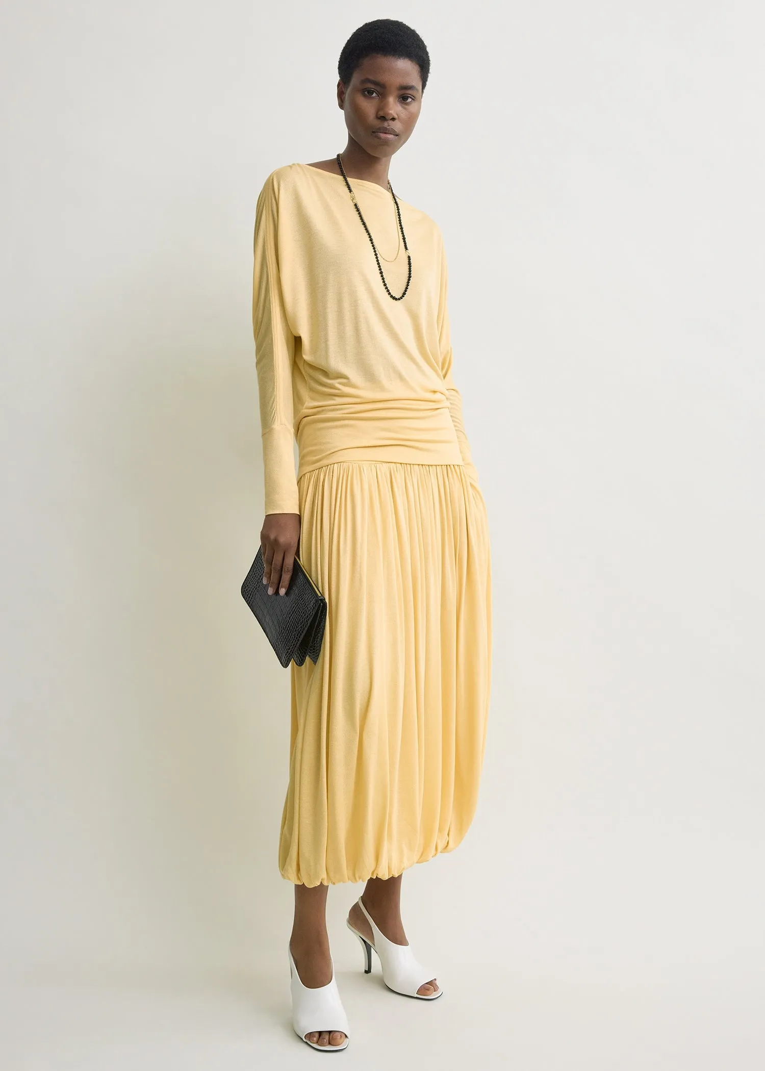 Boatneck jersey top champagne sold by Toteme