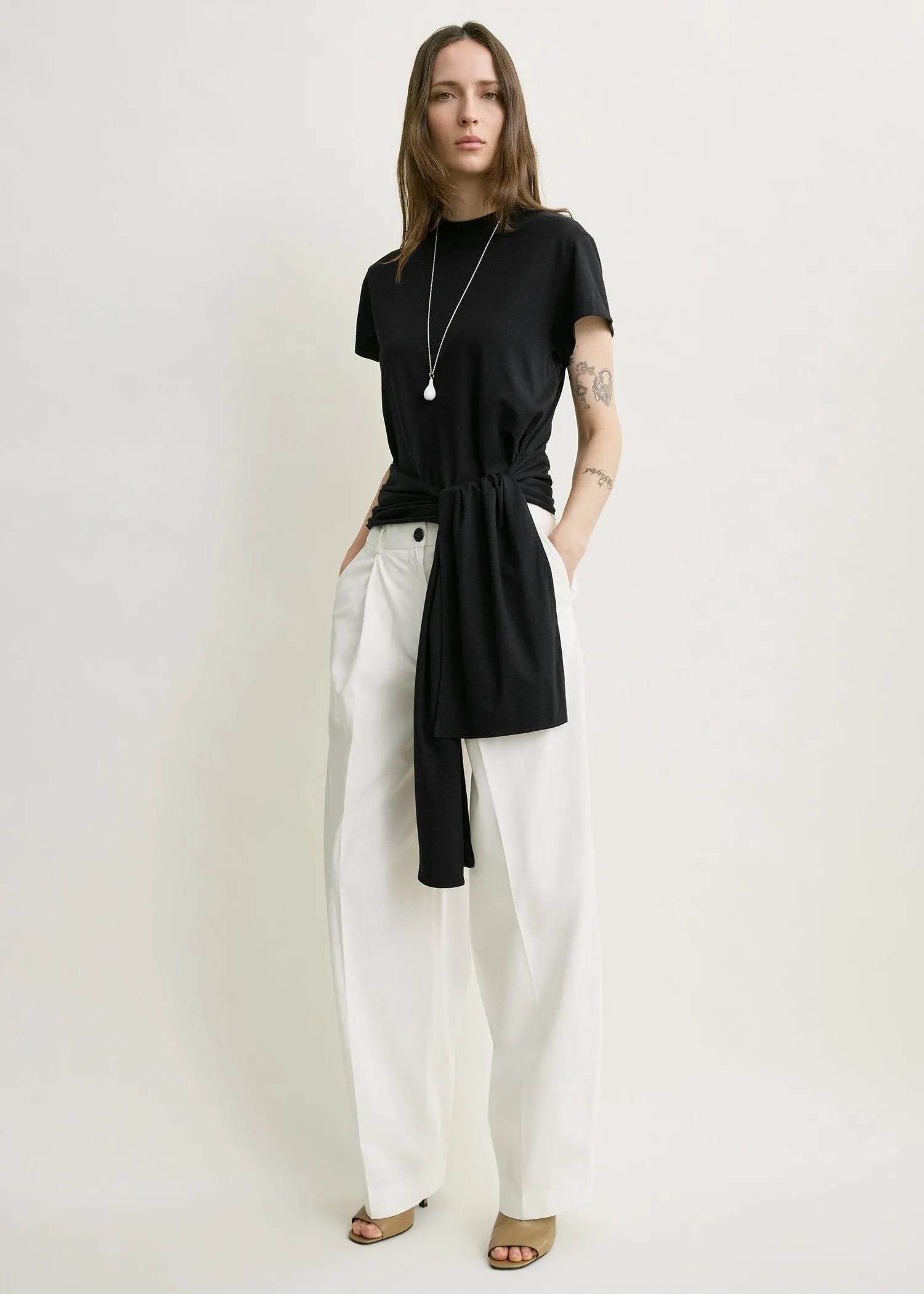 Single pleat cotton trousers white sold by Toteme