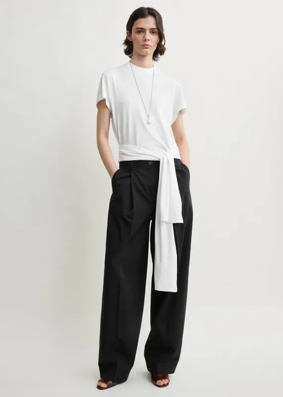 Single pleat cotton trousers black made by Toteme