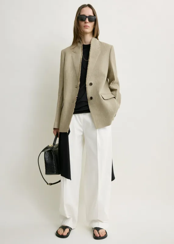 Raw lapel jacket beige made by Toteme