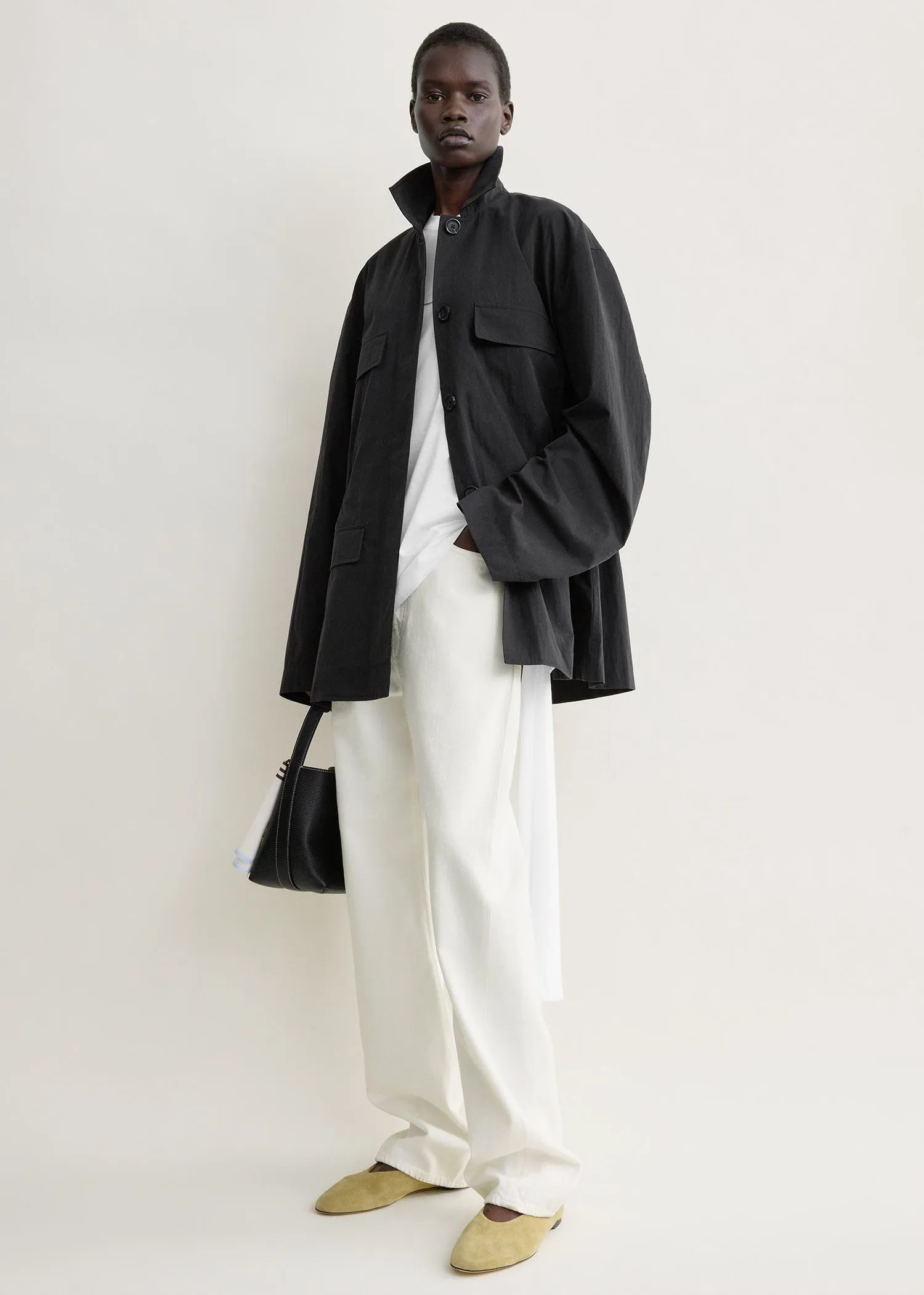 Collared drawstring jacket black sold by Toteme