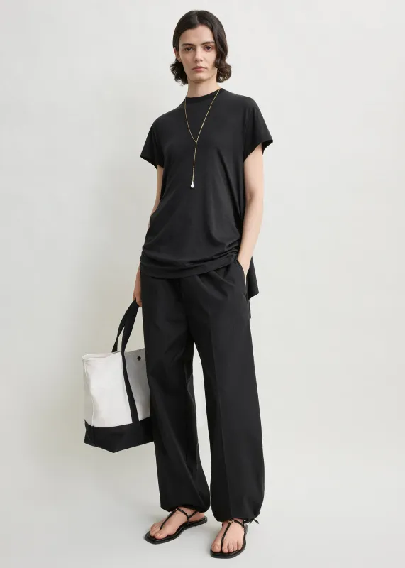 Drawstring cotton trousers black made by Toteme