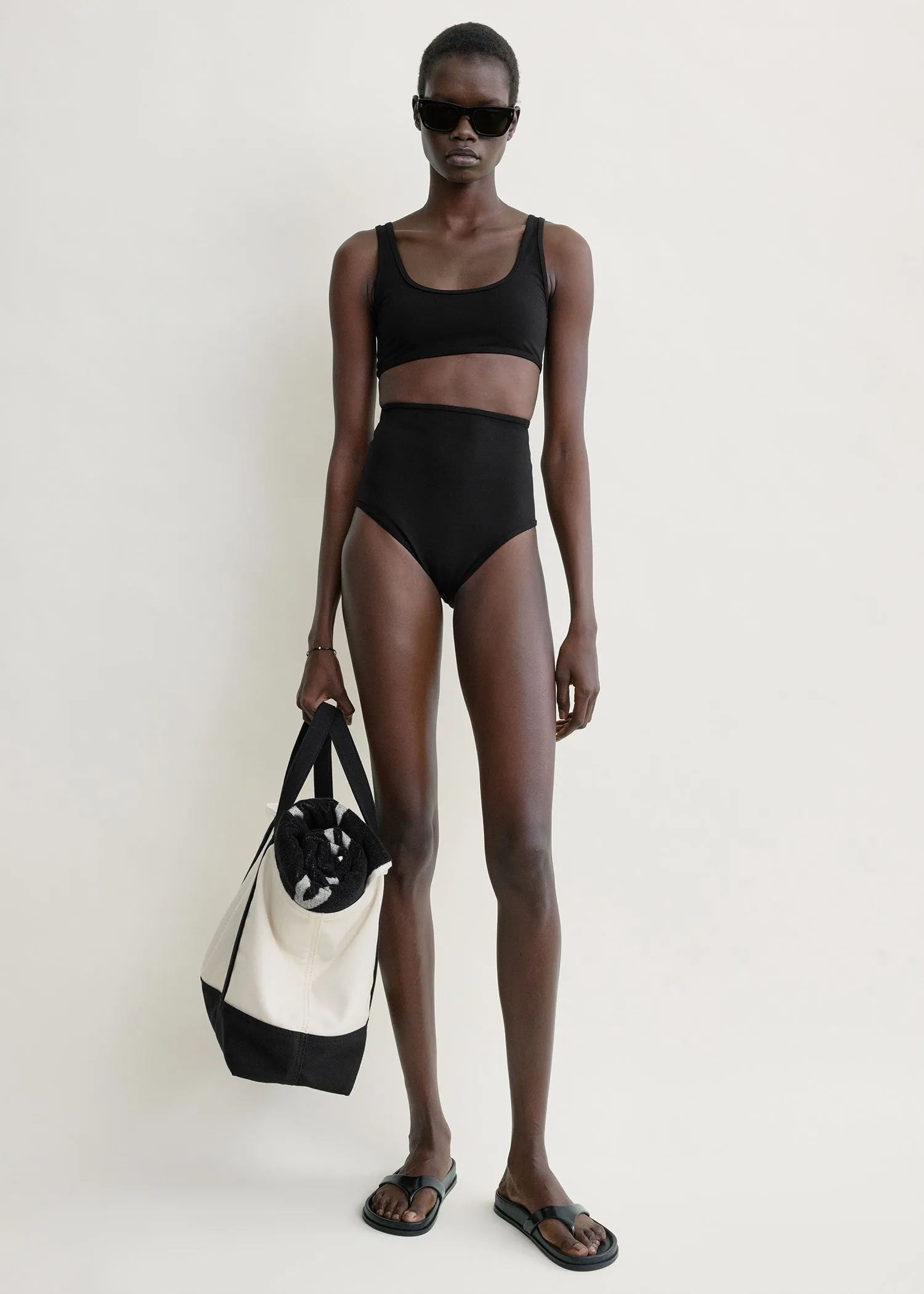 U-neck bikini top black sold by Toteme