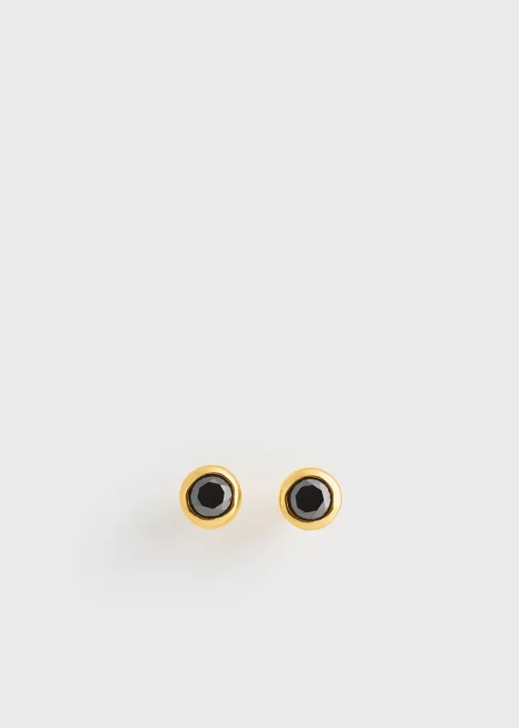 Mini diamond studs black/gold made by Toteme