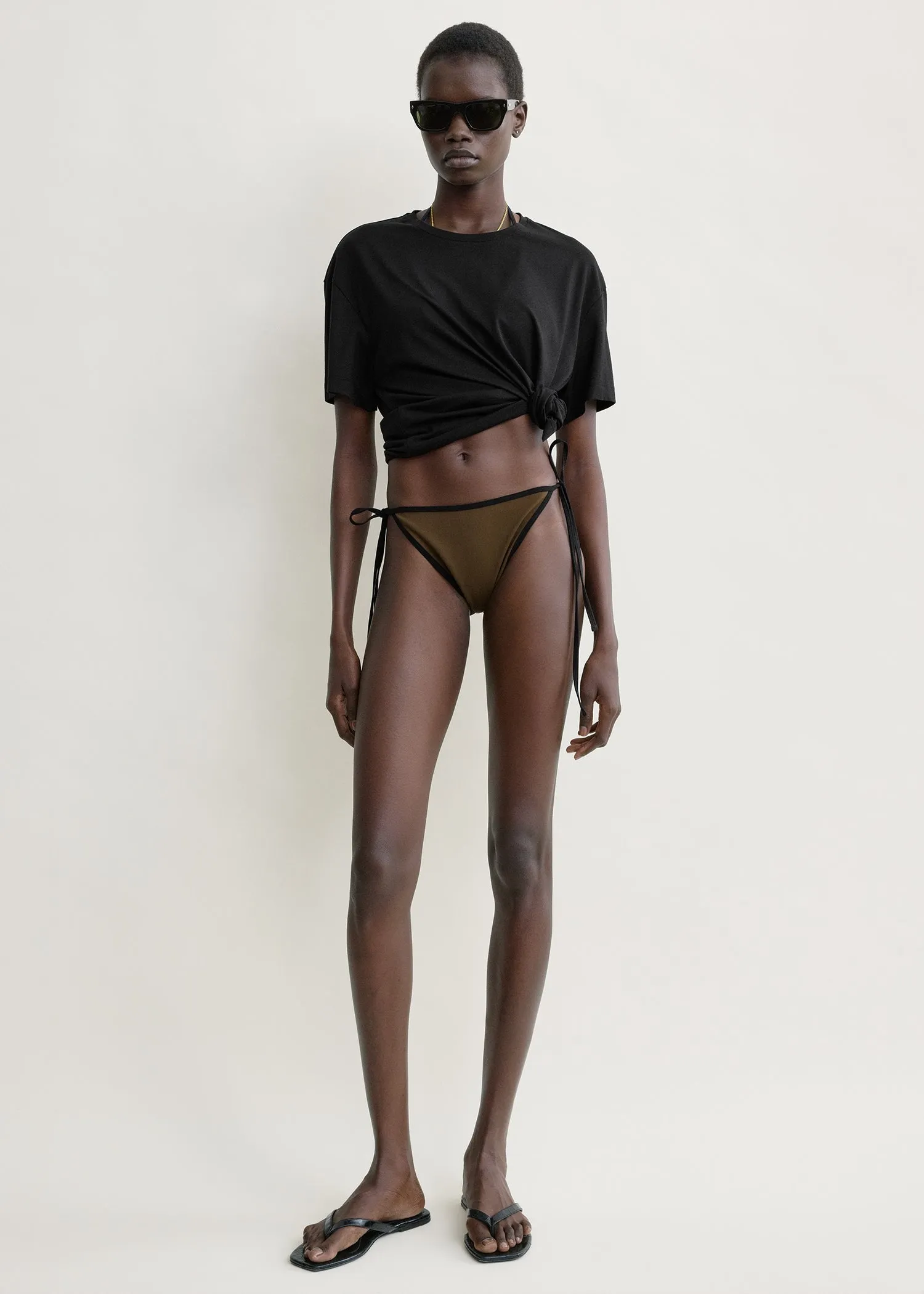 Stripe tie bikini bottoms walnut sold by Toteme