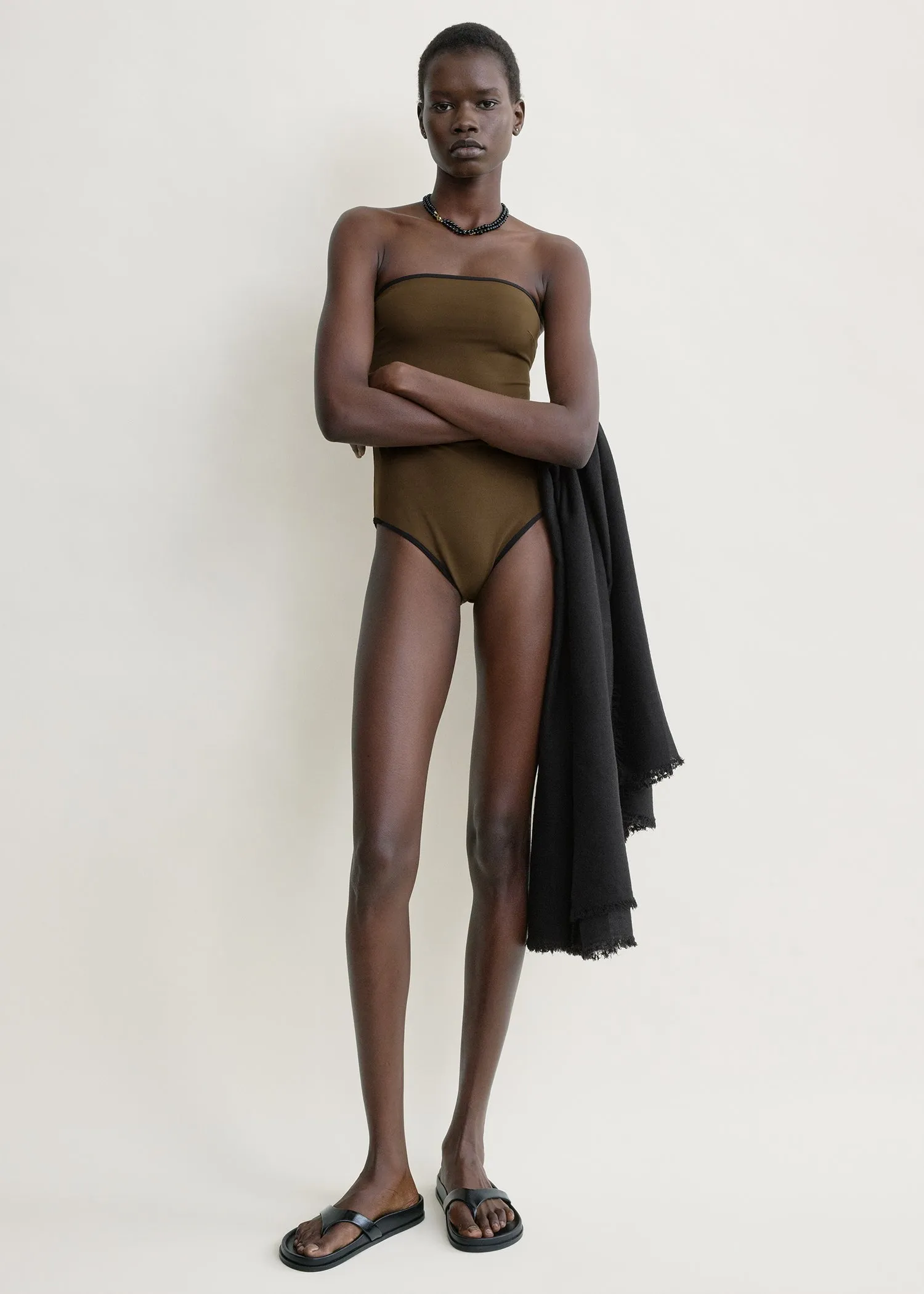 Stripe edge strapless swimsuit walnut sold by Toteme
