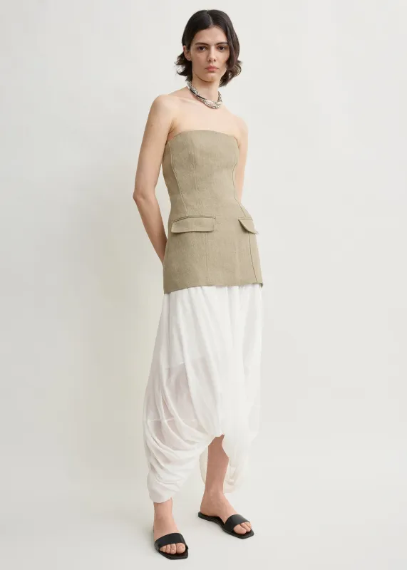 Strapless linen pocket top beige made by Toteme