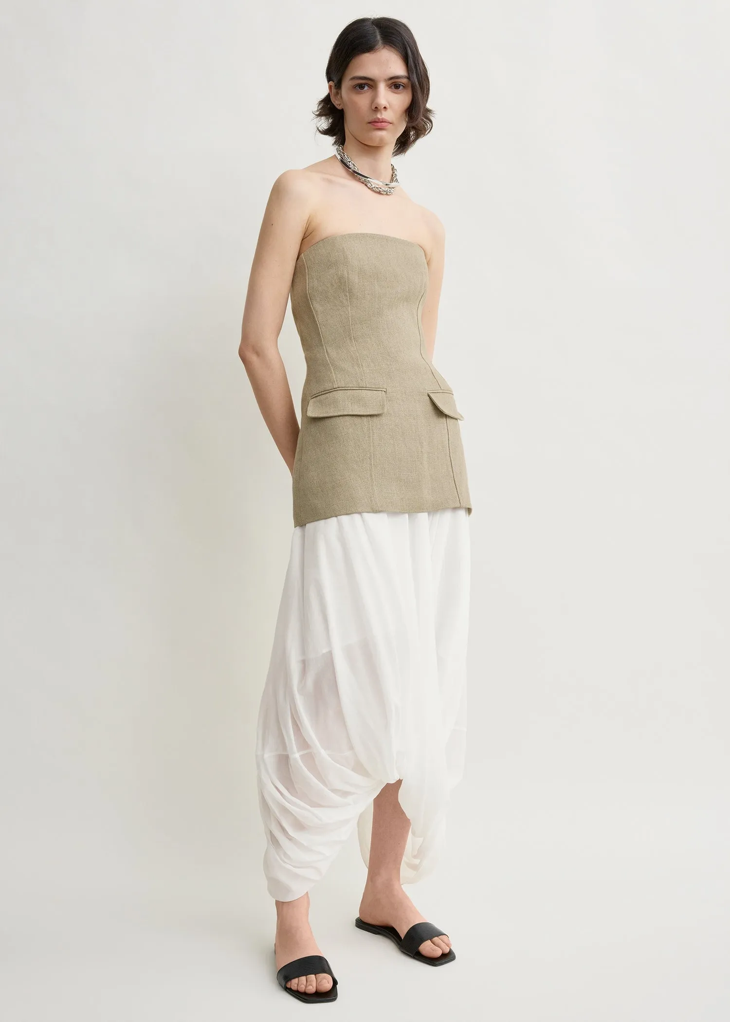 Strapless linen pocket top beige sold by Toteme