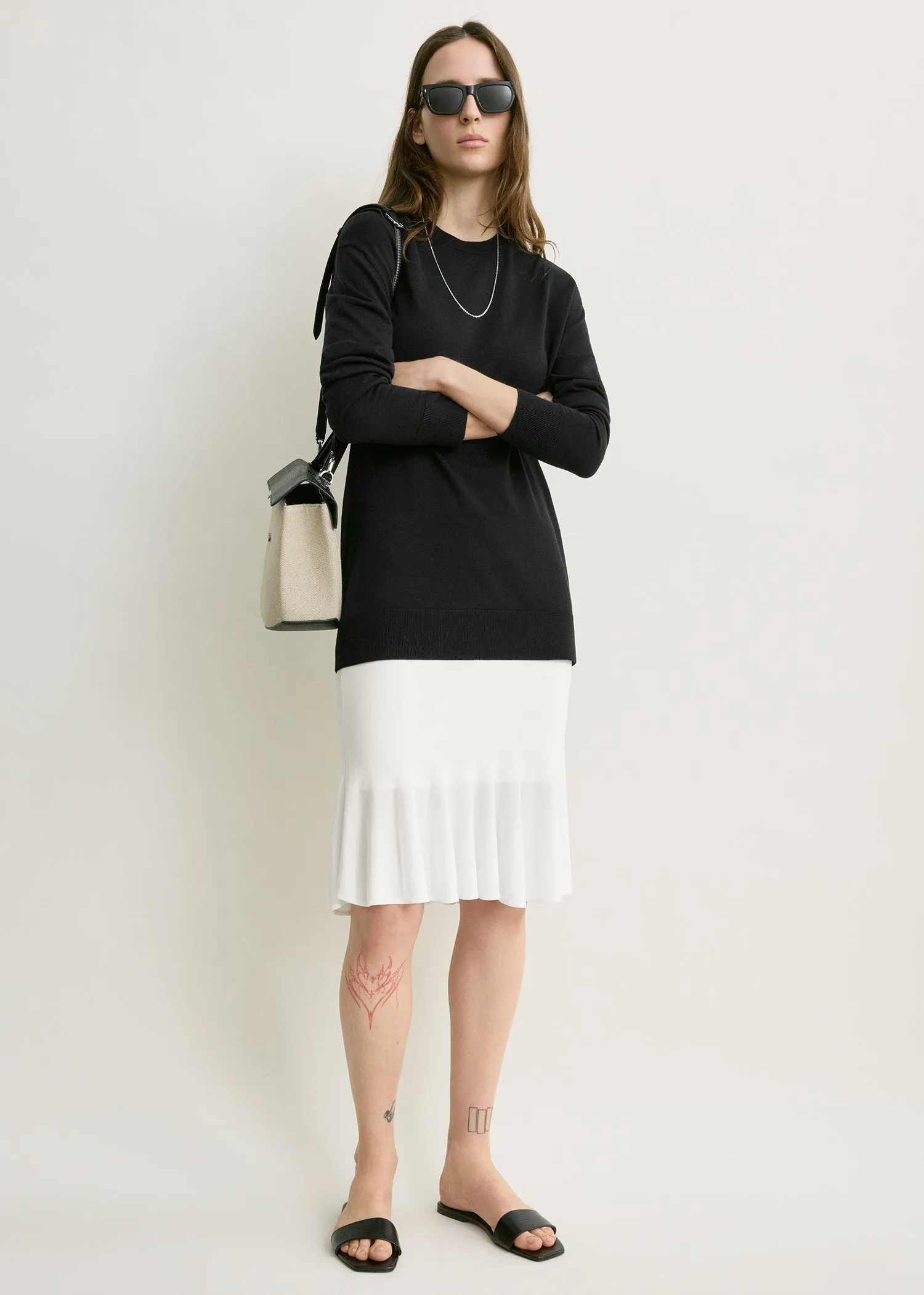 Fluted knit skirt optic white sold by Toteme