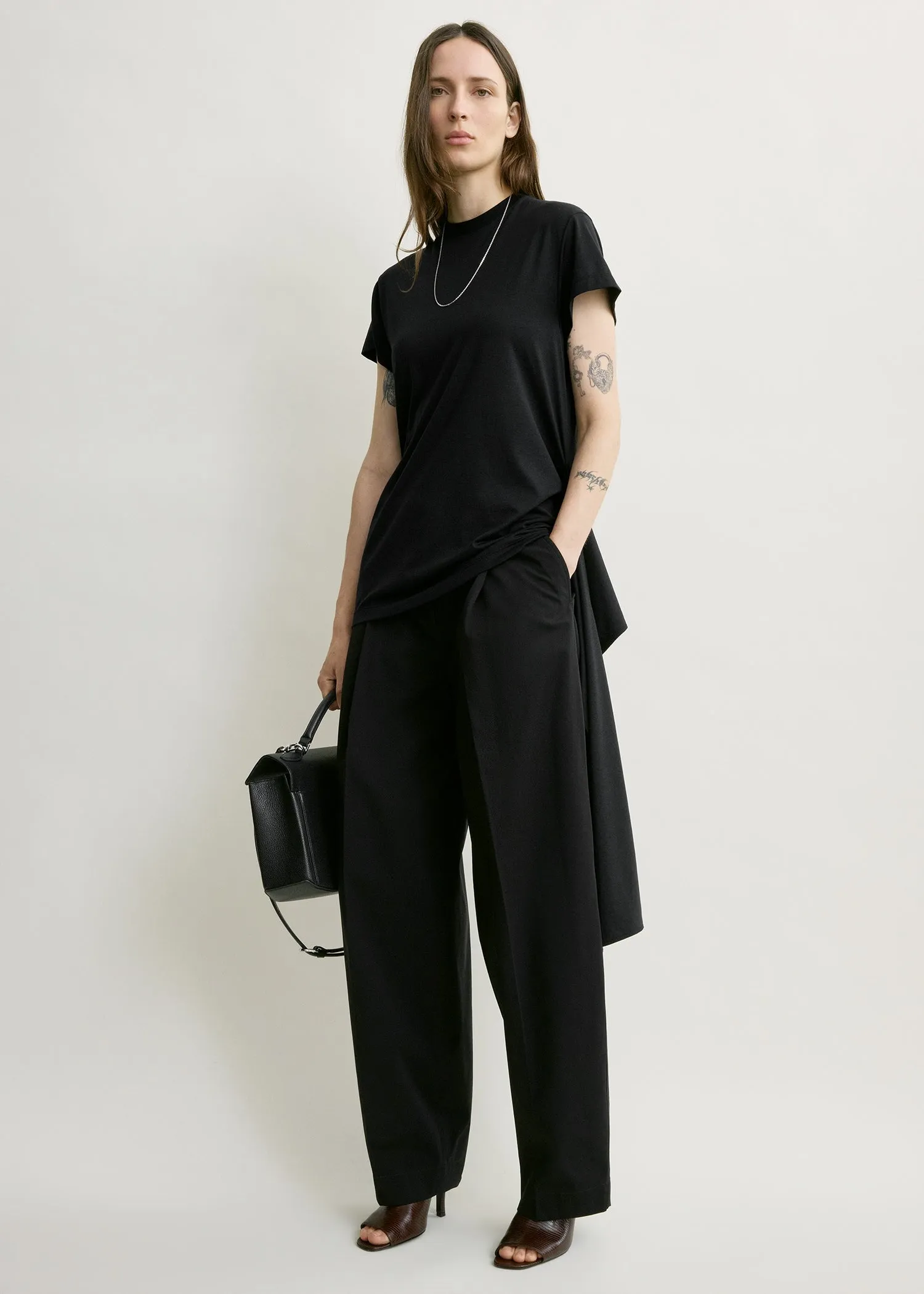 Tie-waist jersey top black sold by Toteme
