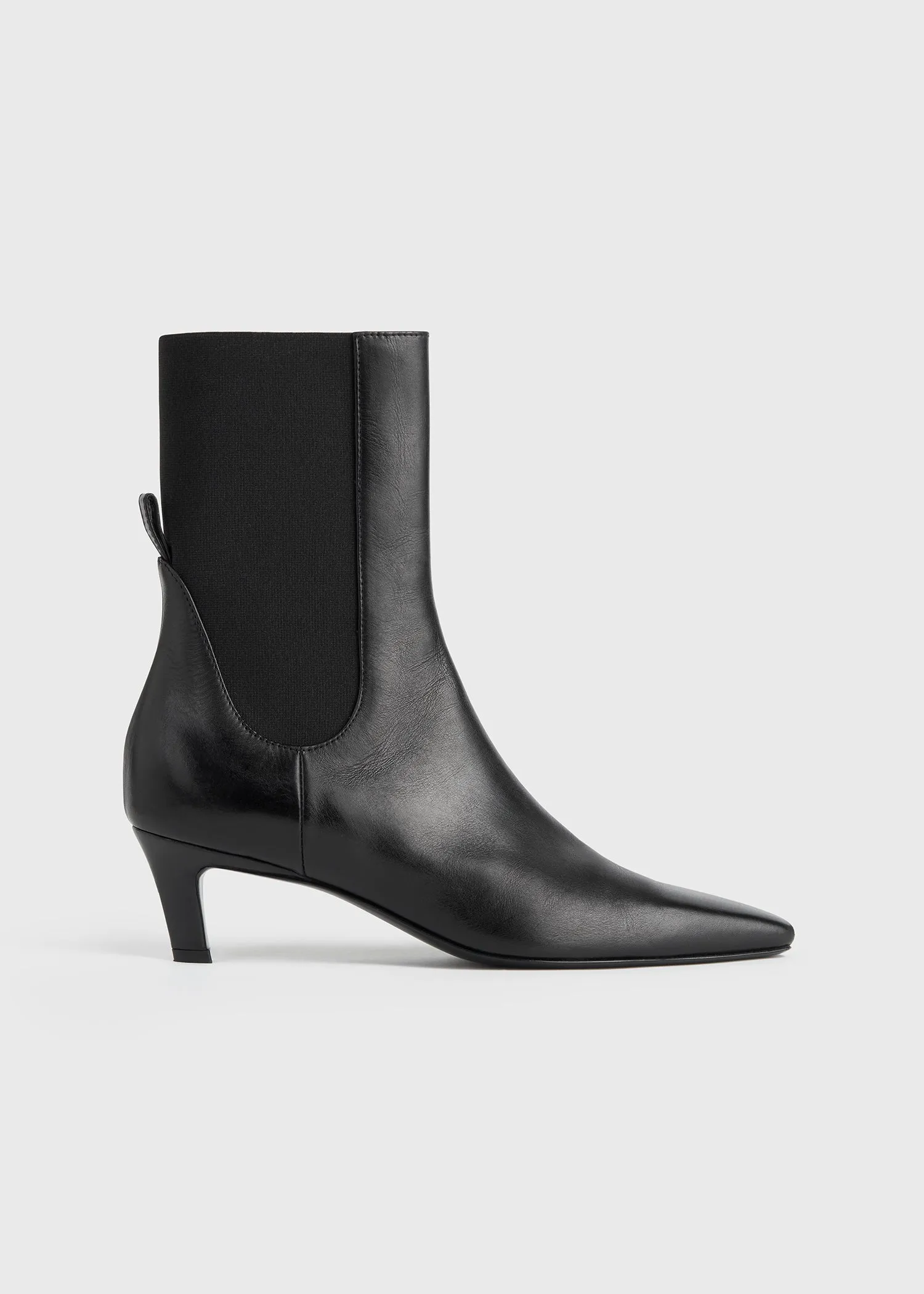 Leather mid-heel boots black sold by Toteme