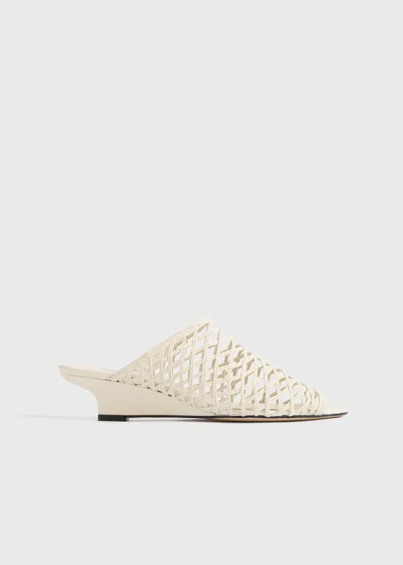 Summer woven mules macadamia made by Toteme