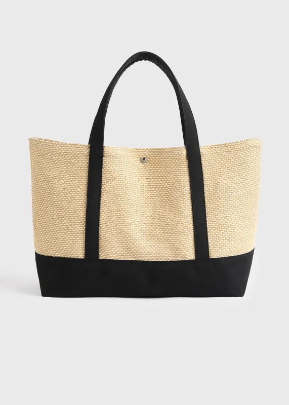 Woven beach tote black/ecru made by Toteme