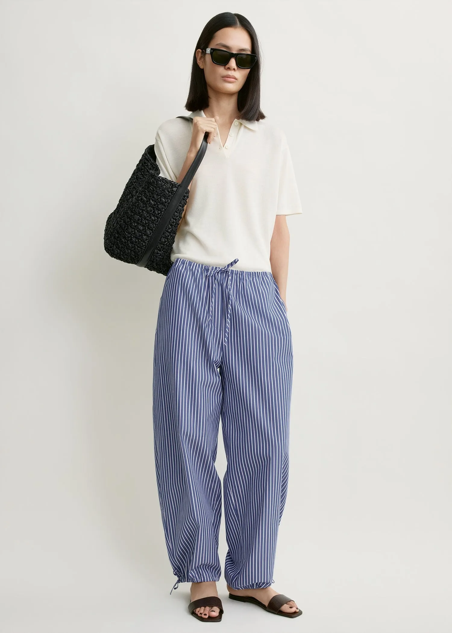 Striped drawstring cotton trousers ink blue/pink stripe sold by Toteme