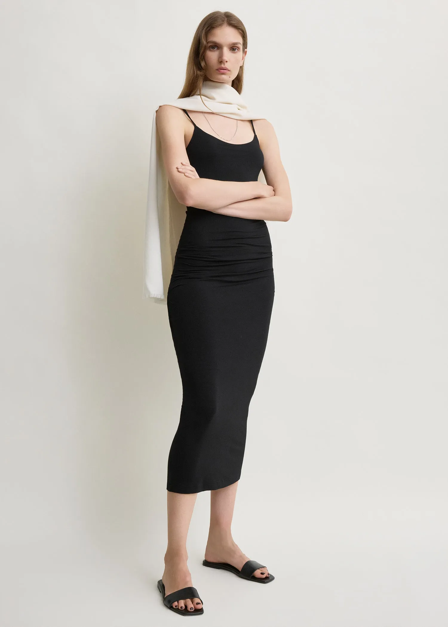 Draped slip dress black sold by Toteme