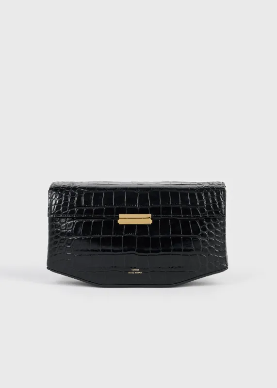 Clip croco-embossed clutch black made by Toteme