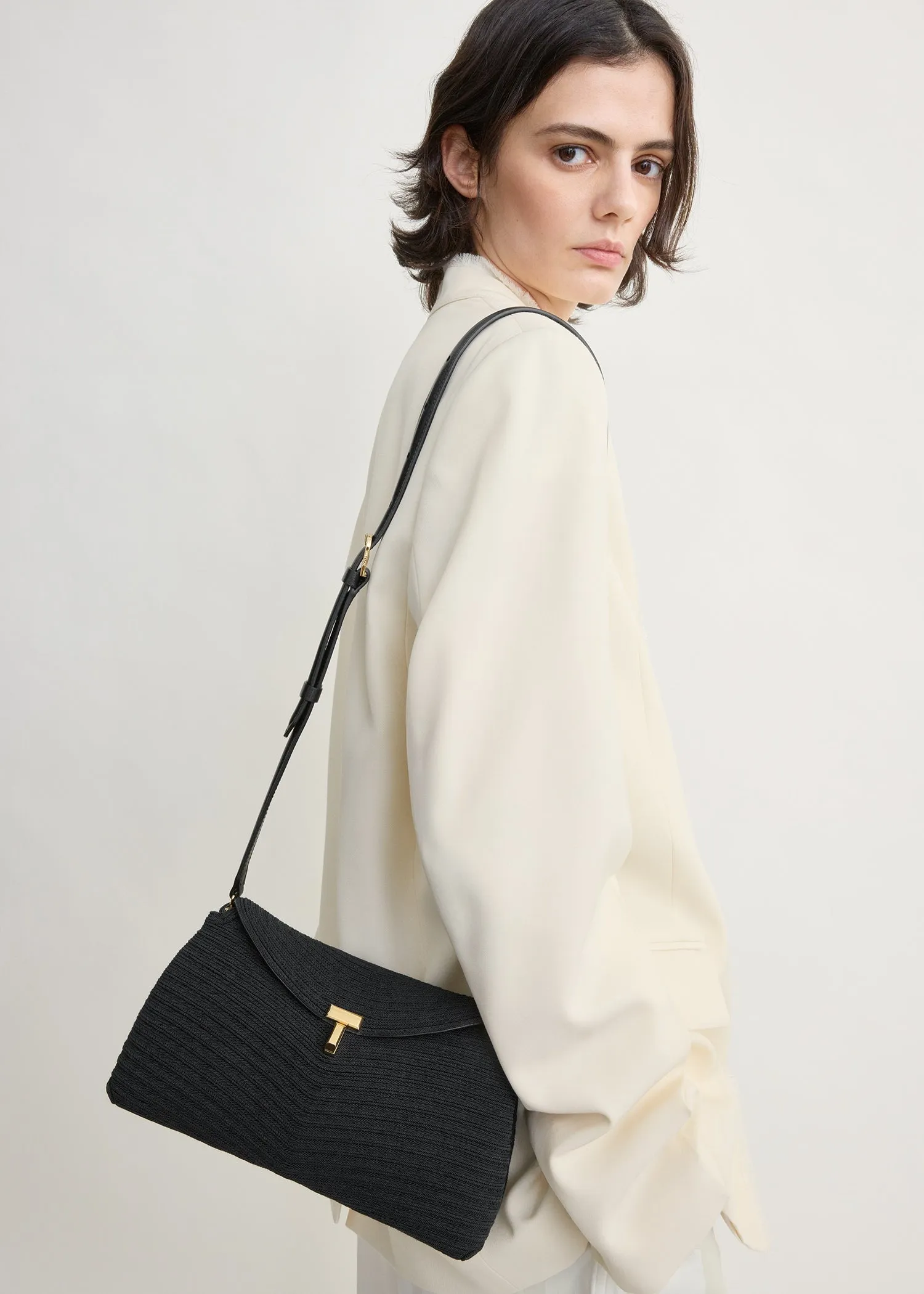 T-lock rope clutch black sold by Toteme product image thumbnail 3