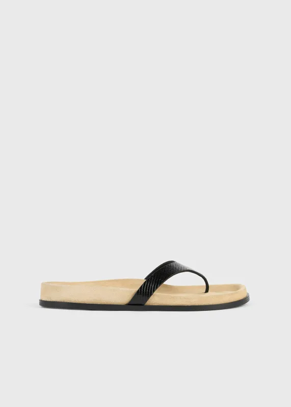 Contoured lizard-embossed flip flops beige/black made by Toteme