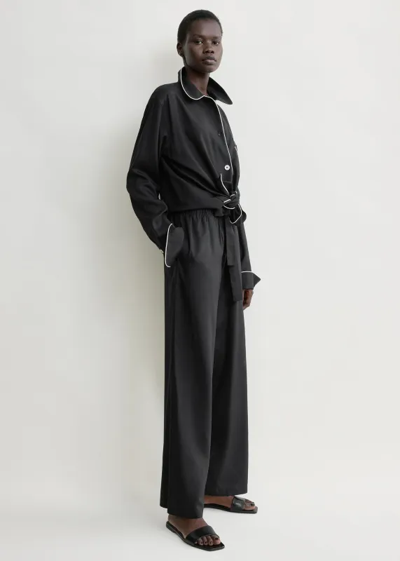 Piped silk trousers black made by Toteme