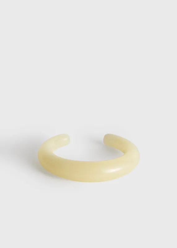Sculpted cuff buttercup made by Toteme
