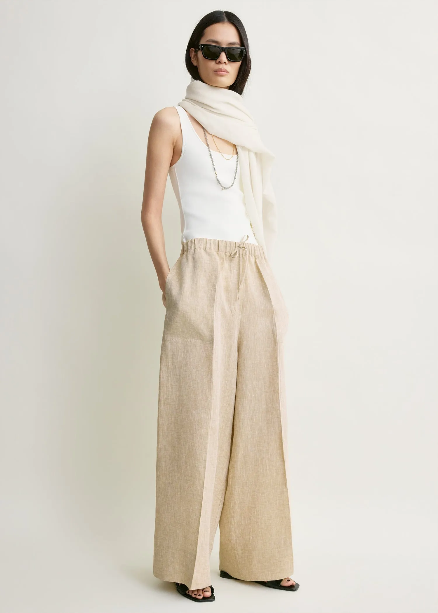 Wide summer trousers natural sold by Toteme