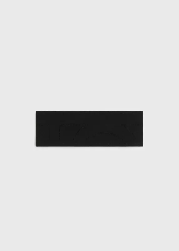 Pointelle monogram headband washed black made by Toteme