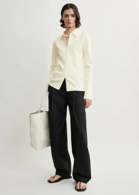 Compact knit buttoned top white made by Toteme