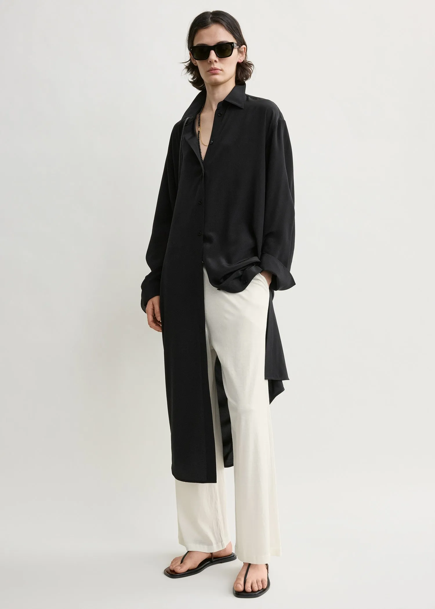 Silk shirtdress black sold by Toteme