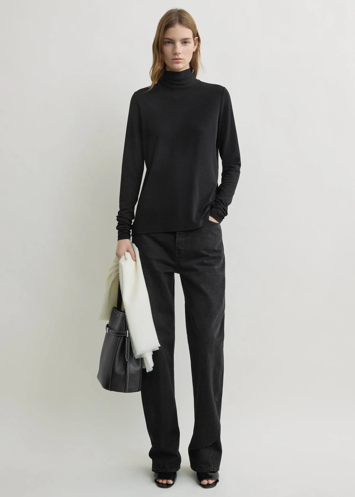 High-neck jersey top black sold by Toteme
