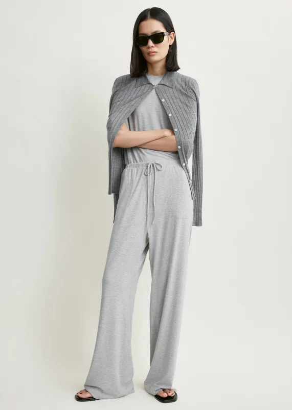 Jersey drawstring trousers pale grey mélange made by Toteme