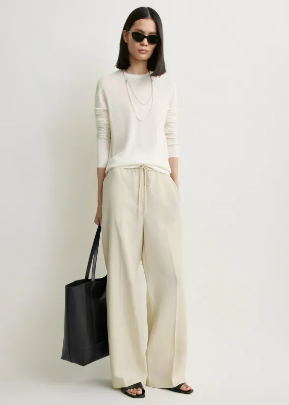 Fluid drawstring trousers talc made by Toteme