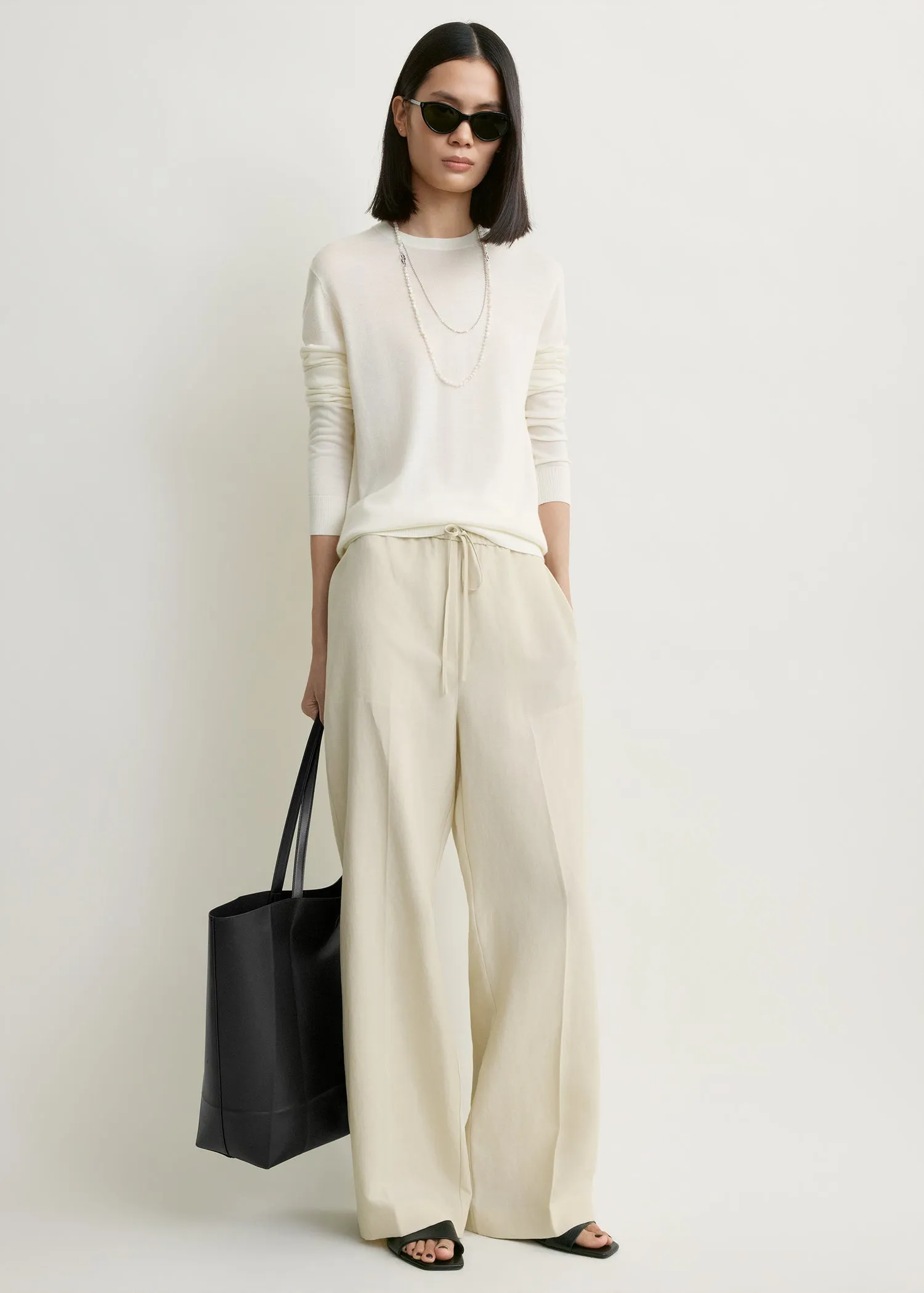 Fluid drawstring trousers talc sold by Toteme