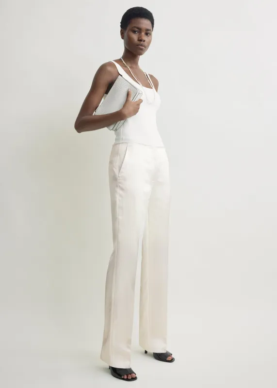 Easy raw edge trousers white made by Toteme