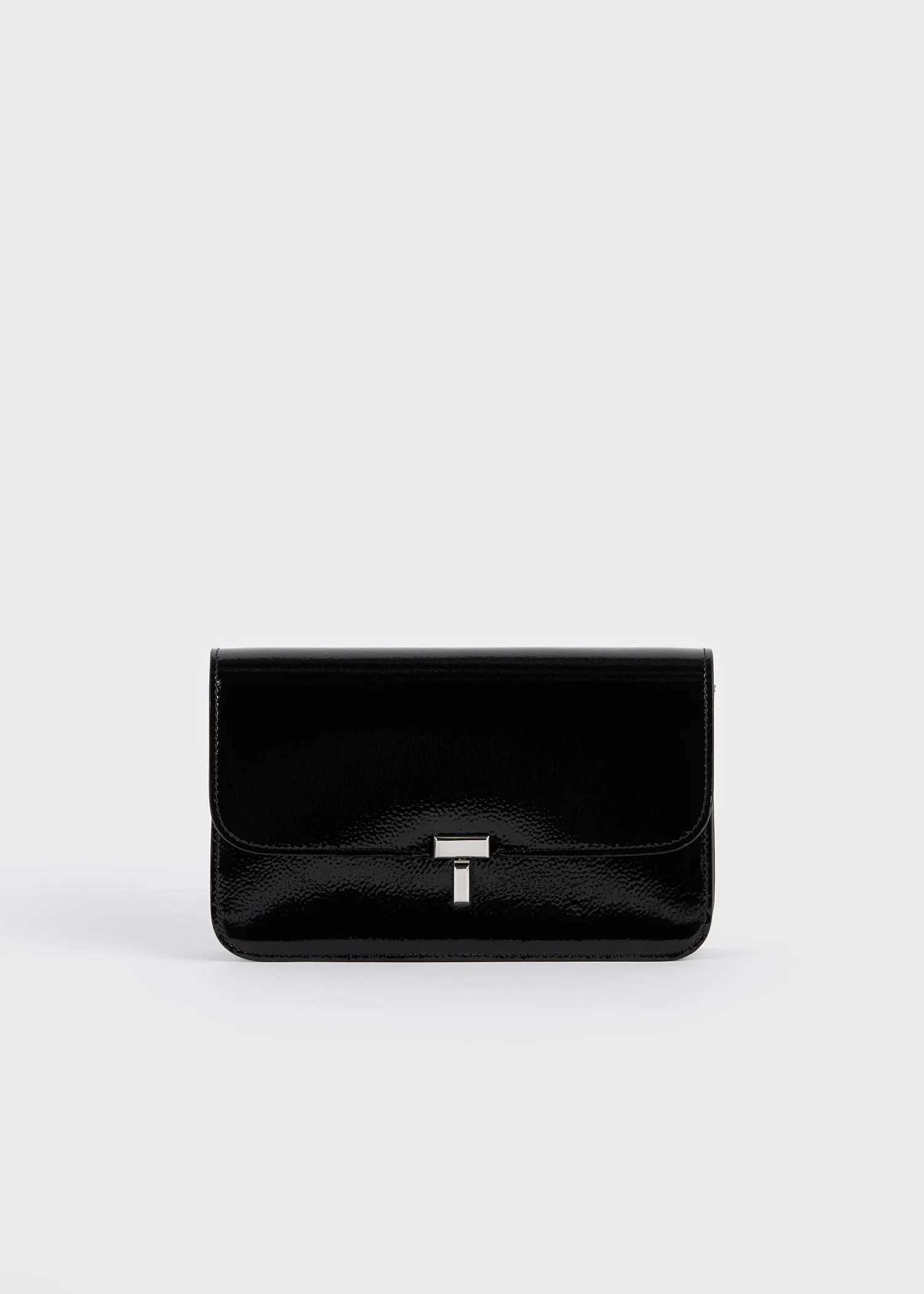 T-lock grained-patent crossbody black sold by Toteme