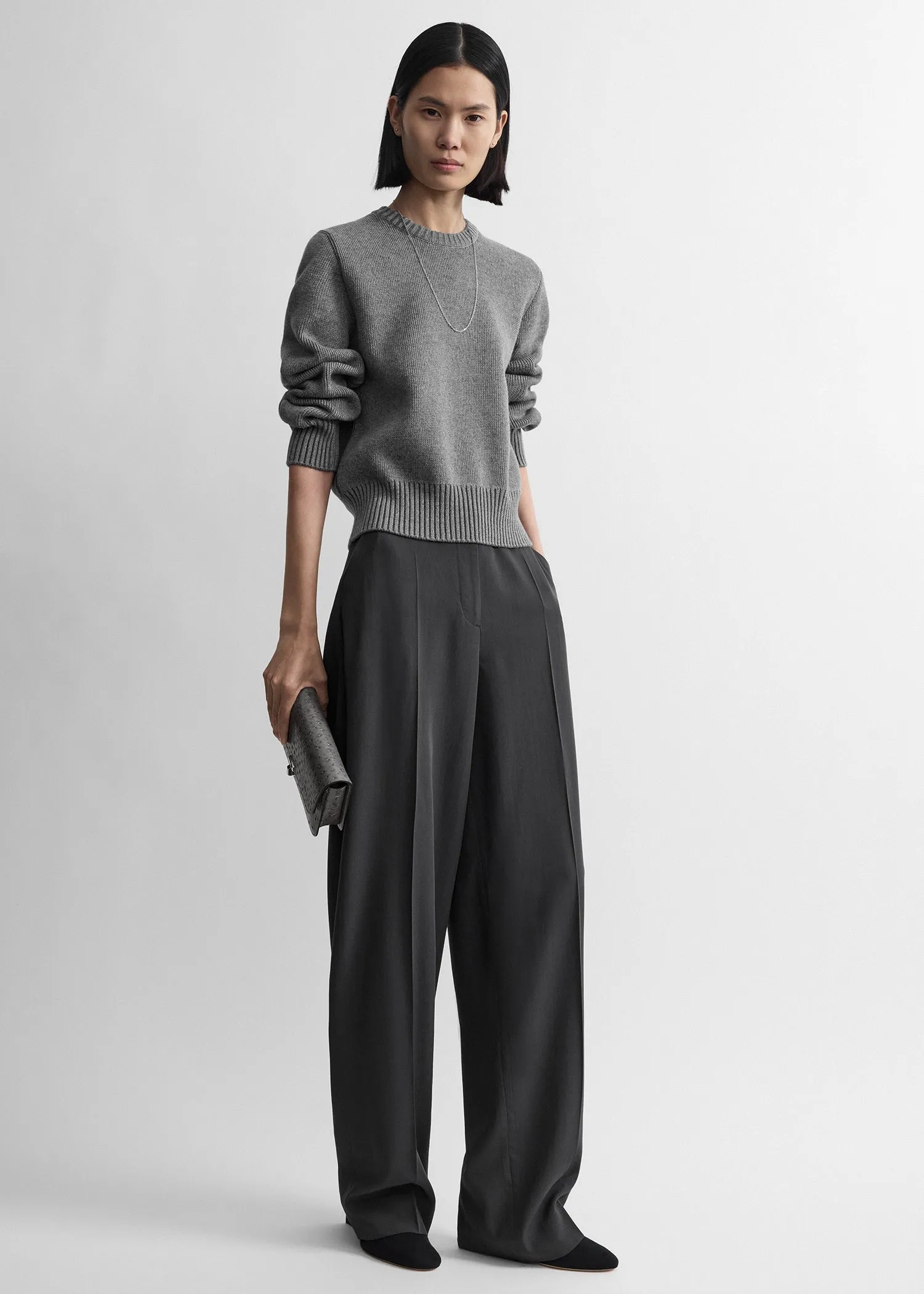 High-waist trousers washed black sold by Toteme