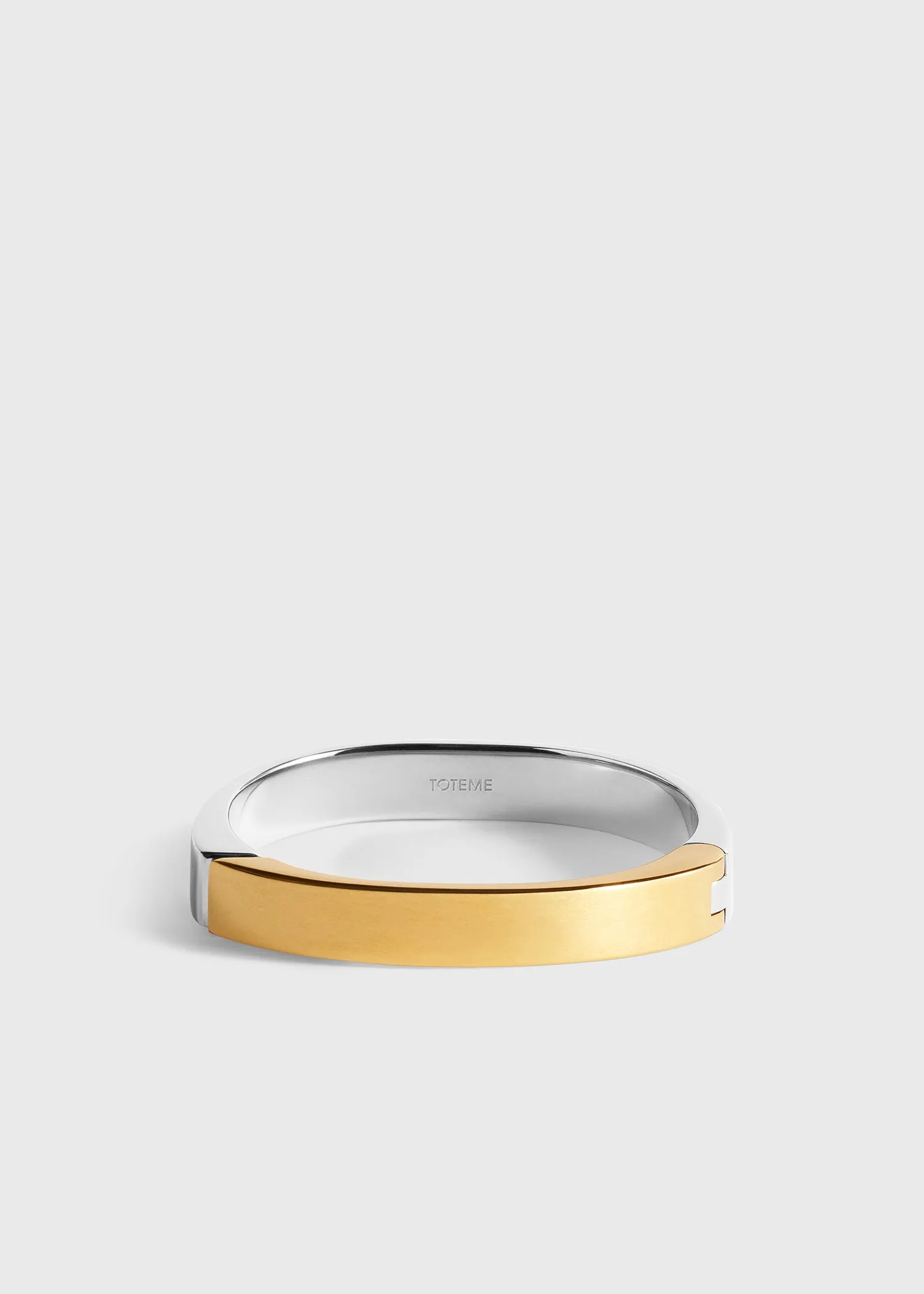 Signature bracelet silver/gold sold by Toteme