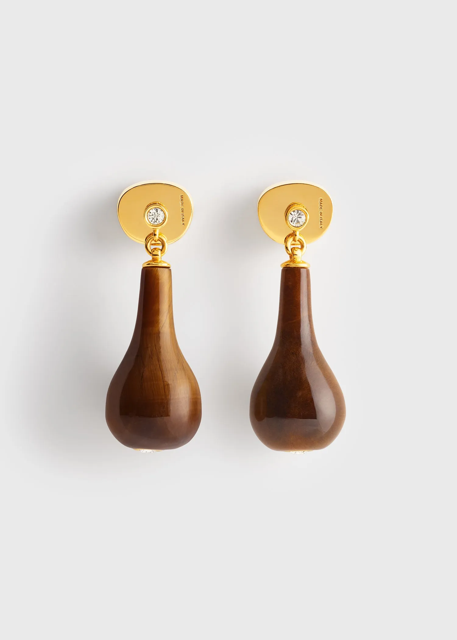 Tiger's eye drops honey/gold sold by Toteme