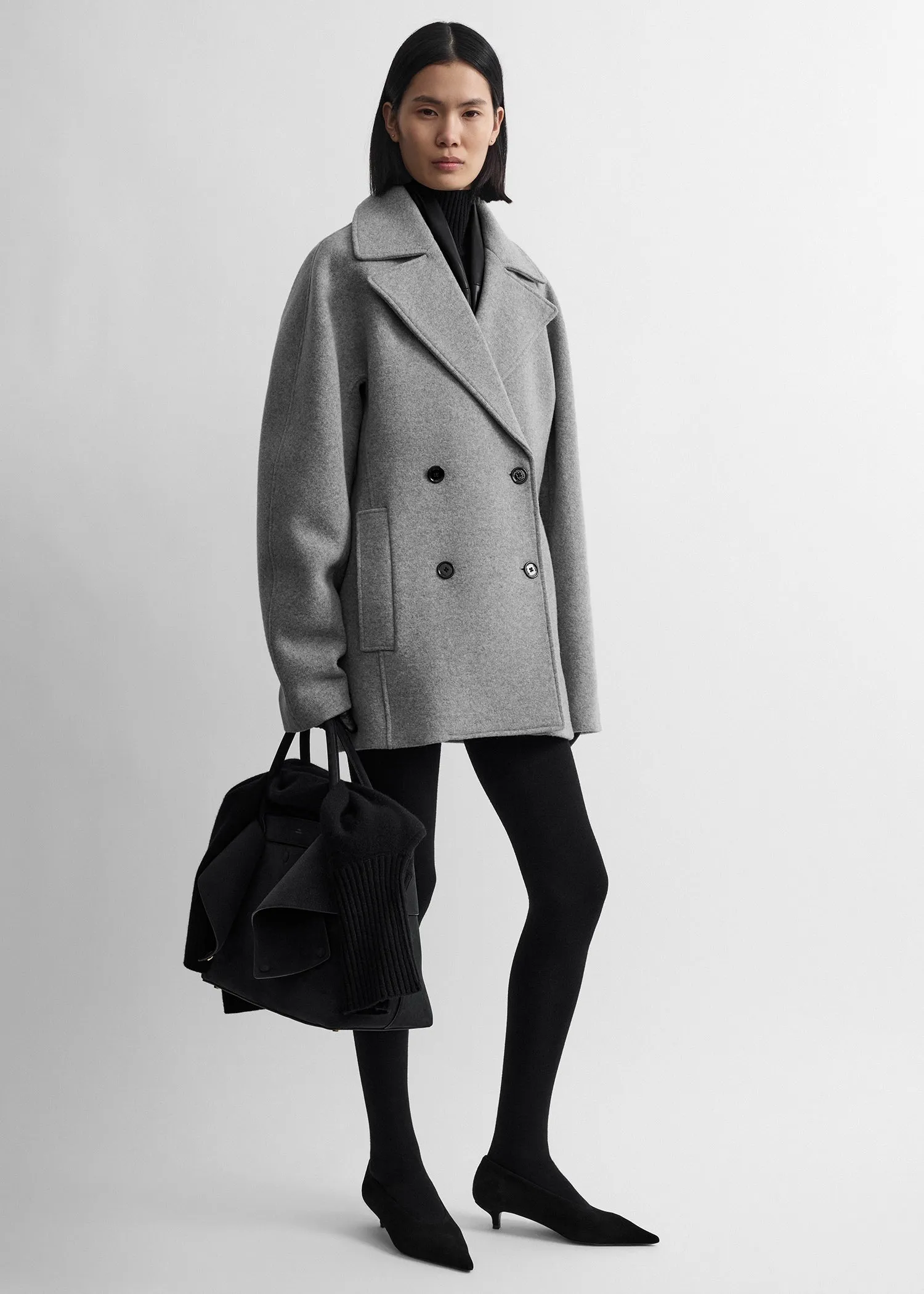 Rounded peacoat grey melange sold by Toteme