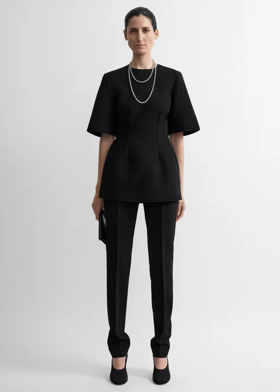 Sculptural scuba top black made by Toteme