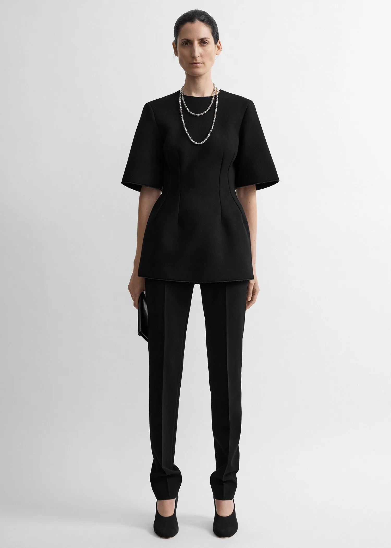 Sculptural scuba top black sold by Toteme