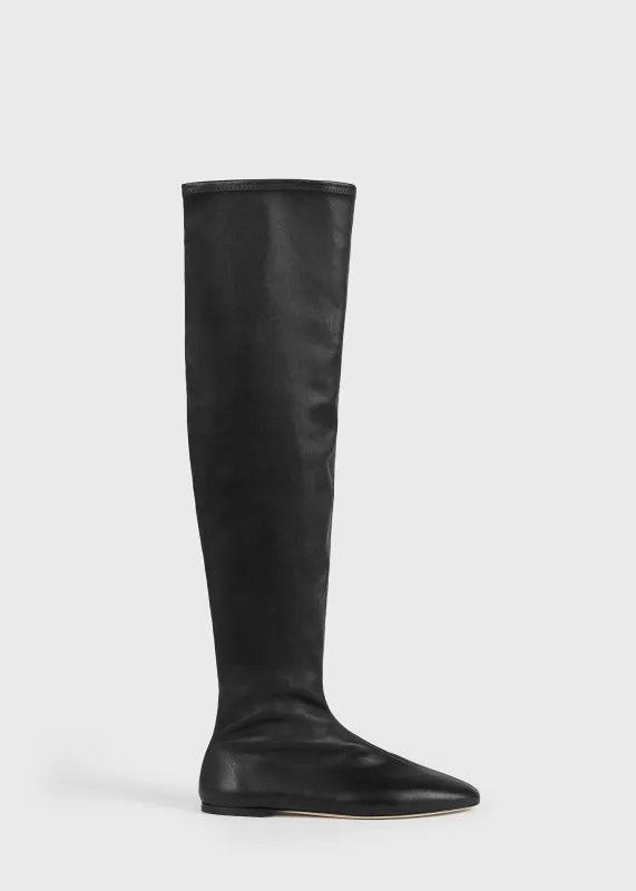Deconstructed stretch nappa boots black made by Toteme