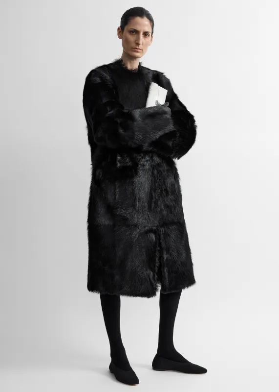 Structured shearling coat black made by Toteme