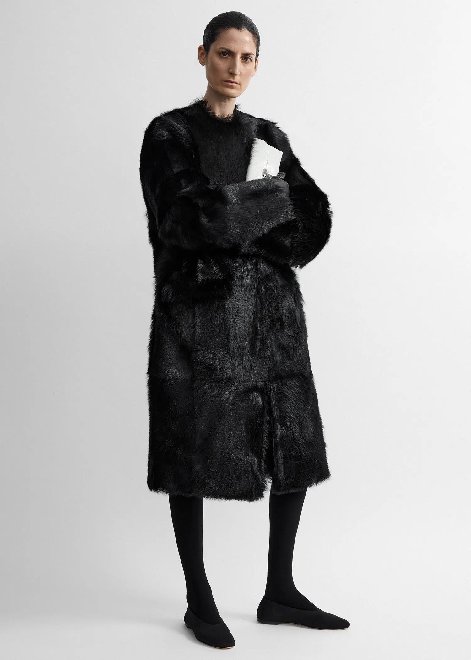Structured shearling coat black sold by Toteme