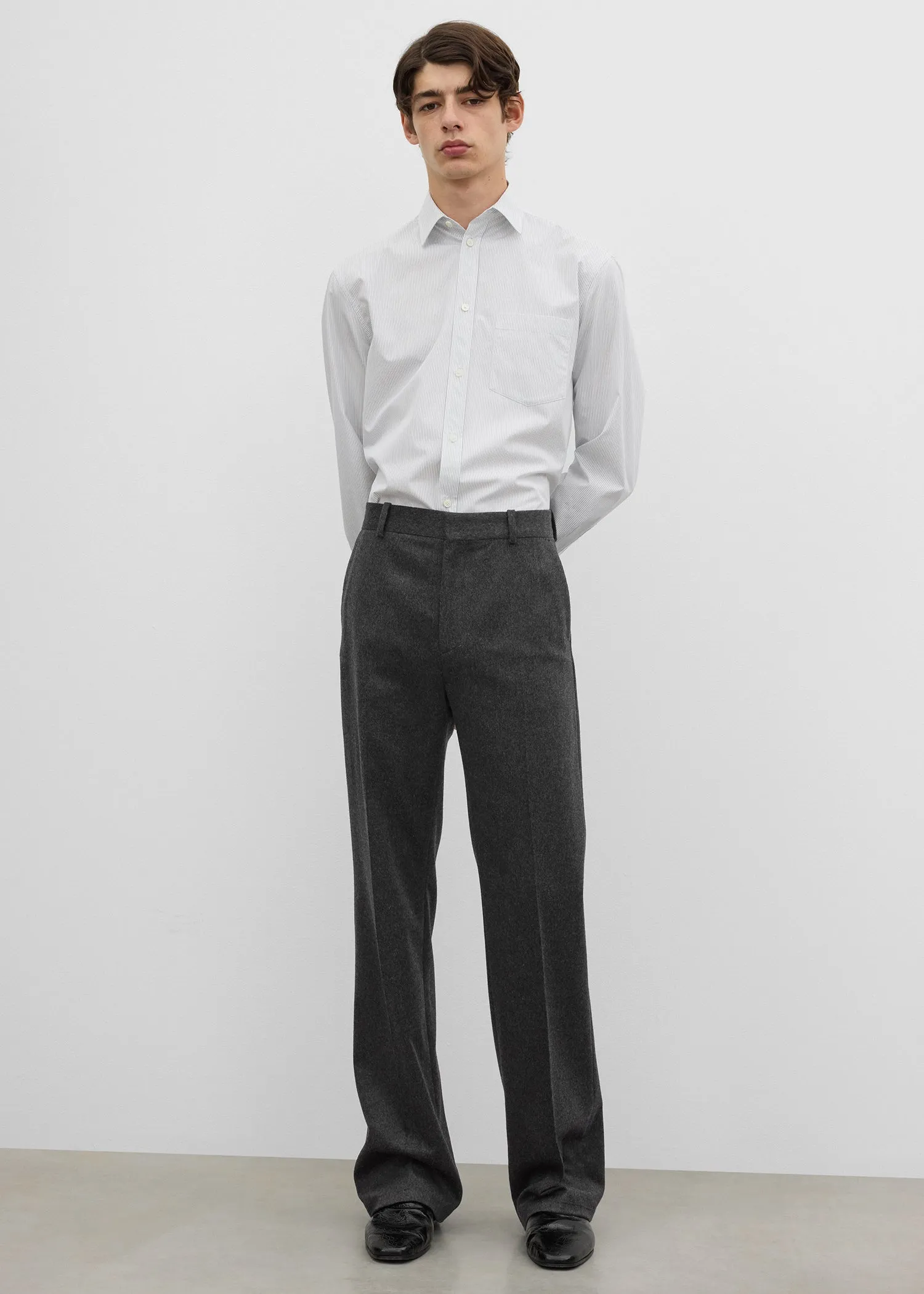 Relaxed trousers charcoal melange sold by Toteme