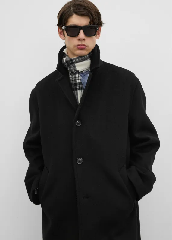 Relaxed coat black made by Toteme
