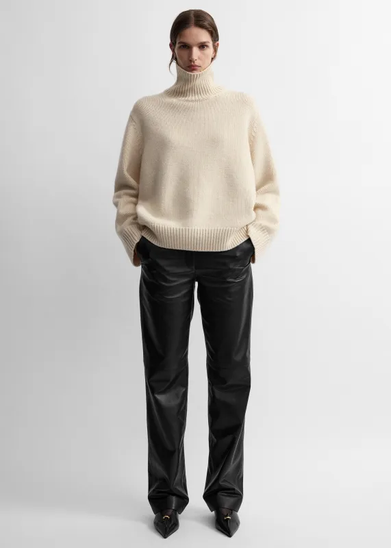 Oversized lambswool turtleneck almond made by Toteme