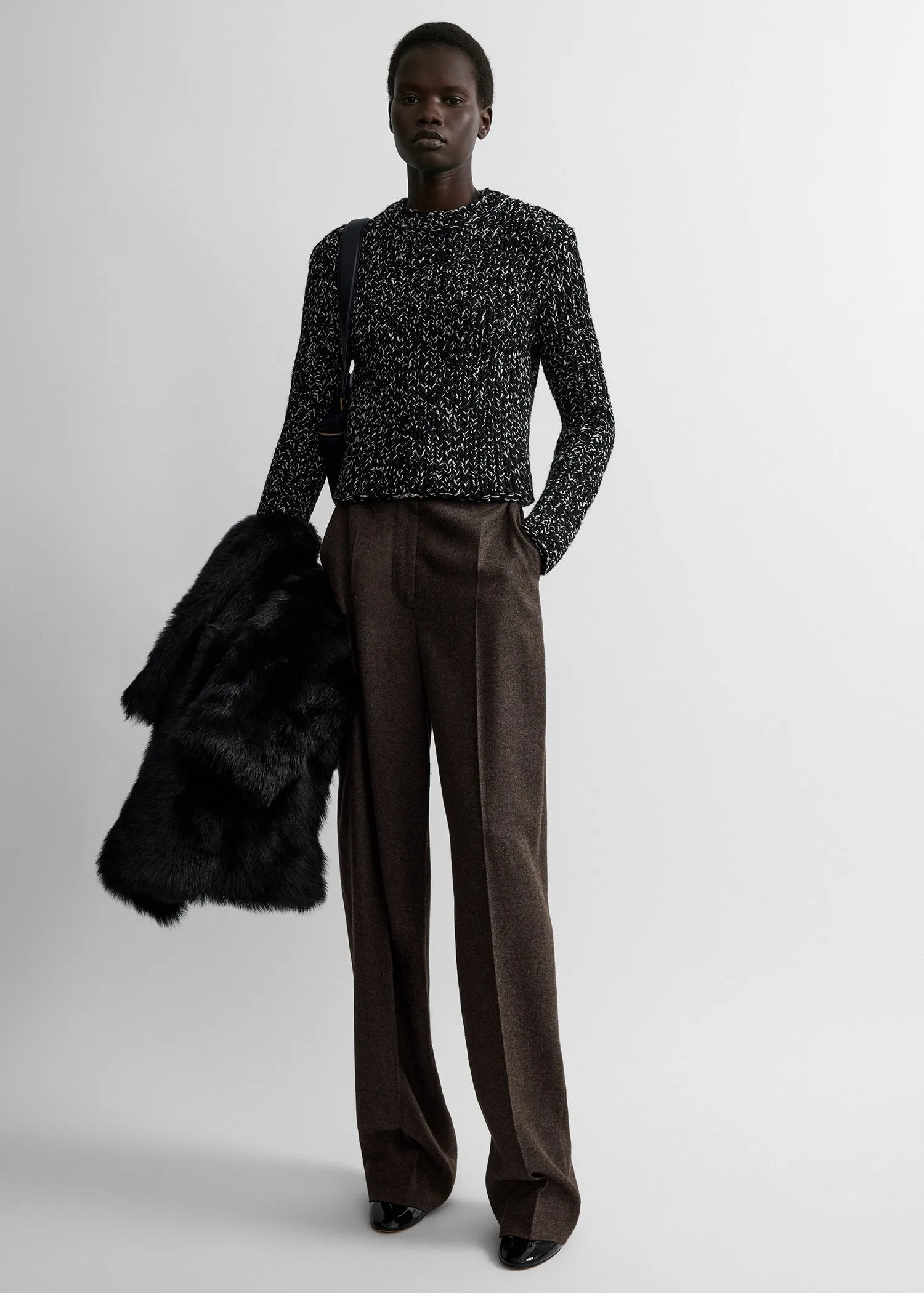 Wool silk crew neck black/ecru sold by Toteme