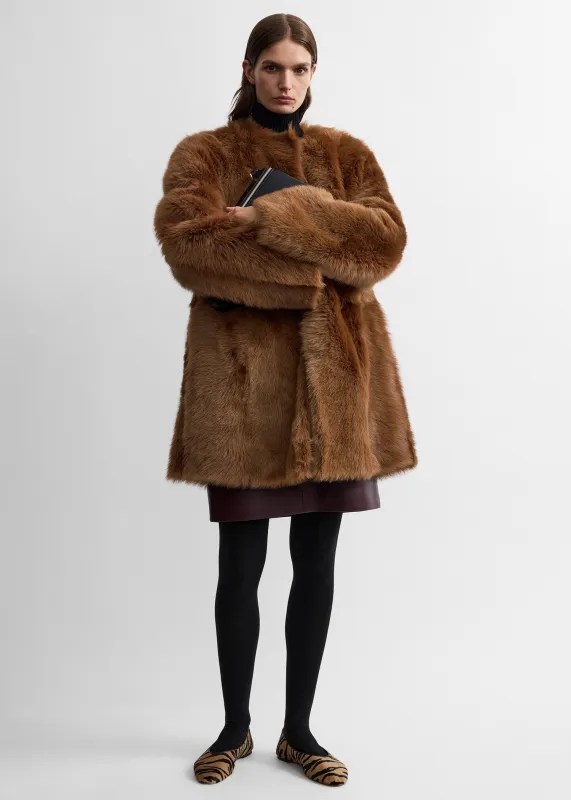 Short silky shearling coat ginger made by Toteme