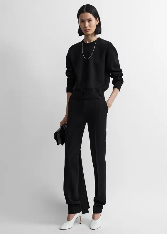 Slim stretch wool trousers black made by Toteme