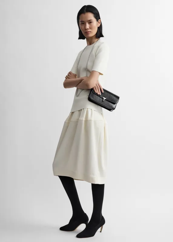 Sculptural skirt ecru made by Toteme